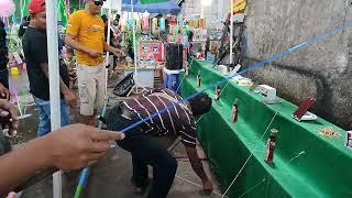 RAHASIA TRIK PERMAINAN MEMASUKAN  GELANG DI BOTOL  SUPAYA PENTOL KOREK TIDAK JATUH  di pasar malam.