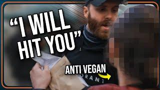 Carnivore Taunts Vegans with Meat at Vegan Event