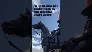 󠁧󠁢󠁳󠁣󠁴󠁿The famous statue Duke of Wellington and his horse with traffic cone on his Heid head