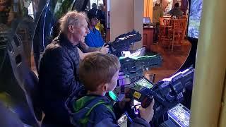 Harry and Max playing video game. Fisherman wharf.  Oct 15 2022