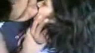 College girl and boy kissing