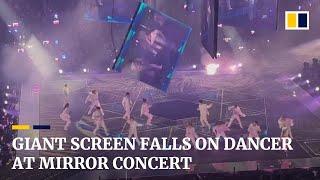 At least 2 people injured by giant video screen falling onto stage at Mirror concert in Hong Kong