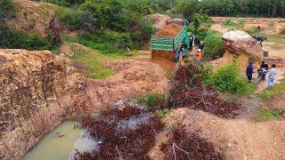 Starting A New Project Filling Stone Pond Strong Bulldozer Komatsu D21P Pushing Soil into Water.