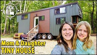 Single mom & daughter tiny house on her own private land