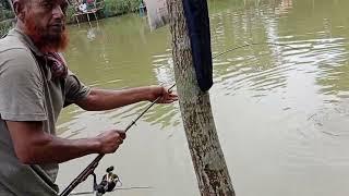 Village fishing competition with fishing rod