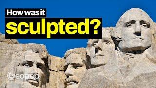 How were the faces of the four American presidents carved on Mount Rushmore?