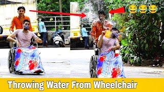 Throwing Water From Wheelchair Prank  Throwing Water Prank  Prakash Peswani Prank 