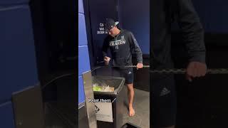 Hockey players prepping their sticks 