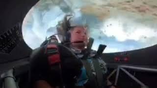 Female pilot vomits in a stunt plane. Attention disgusting