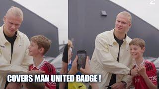 Erling Haaland covers up Man United badge on a young fans Jersey