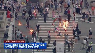 Pro-Palestinian protesters burn flags scuffle with police near Philadelphia City Hall