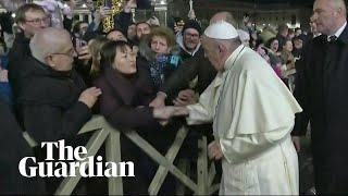 Indignant Pope Francis slaps womans hand to free himself at New Years Eve gathering