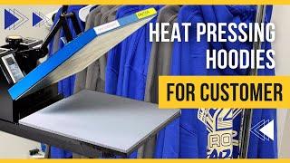 Join me as I heat press hoodies for customer.