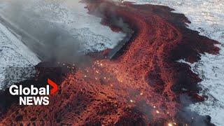 Iceland volcano Mesmerizing drone video shows bubbling lava swallow road near Blue Lagoon