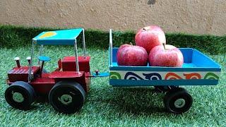 mini multi colour tractor loading apples video Kiran Toys world