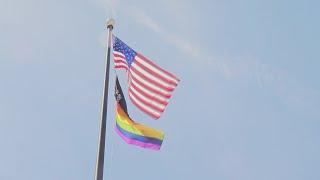 Pride flags displayed at Arkansas Veteran Affairs buildings dividing veterans