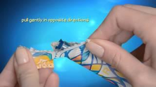 How to use a tampon TAMPAX Compak Pearl Opening the wrapper