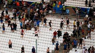 Footage shows Russians chasing English football fans through streets