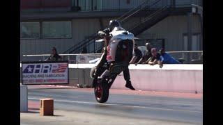 Wild Rides wheelies wall smack reverse slow-mo still shots from KOG Motorcycle race on 10-16-21