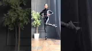 catsuit girl lady latex high heel boot