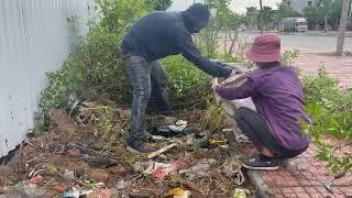 Cleaning the sidewalk near the industrial park full of grass and trash the couple was horrified