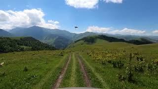 Beautiful views of Nature and the Sound of a Car on a Mountain Road