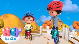 Adoro andar de bicicleta   Música Infantil  HeyKids em Português