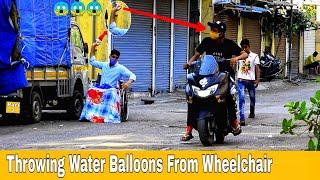 Throwing Water Balloons From Wheelchair  Part 2   Prakash Peswani Prank 