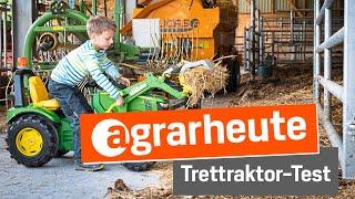 Traktor-Test Kind testet John Deere Trettraktor mit Anhänger