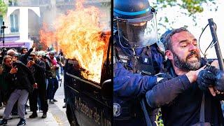 Paris riot police clash with protesters at May Day march