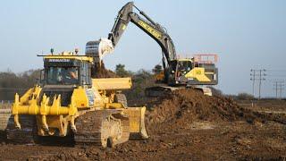 Komatsu D71PXi Cleaning up for Volvo Excavators