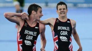 Jonny Brownlee helped over line by brother Alistair