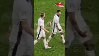 Jude Bellingham gestures towards Slovakia fans and bench after scoring last minute goal for England