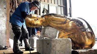 The process of making a giant golden Buddha statue. Korean Sculpture Master