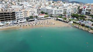 Ammos Beach the best sandy town beach in Agios Nikolaos Crete 4K DJI Drone Greece