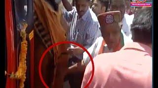 Madhya Pradesh home minister caught on camera touching a woman inappropriately  The Lallantop