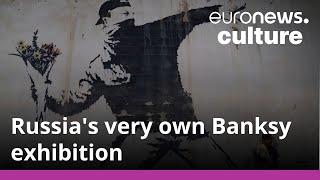 Why has an exhibition of Banksy replicas popped up in Russia?