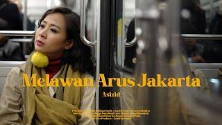 Astrid - Melawan Arus Jakarta Official Lyric Video