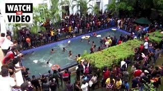 Sri Lankan protesters storm presidential palace swim in pool