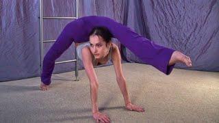 Flexible gymnast Nadya doing extremely oversplits. Contortion workout. Stretching legs.
