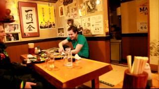 A monkey waiter bringing out hot towels in Izakaya Kayabukiya Utsunomiya Japan.