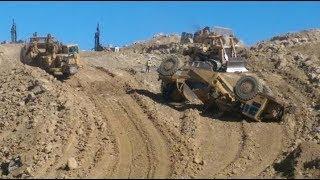 Heavy Equipment Action w Mountain Blasting