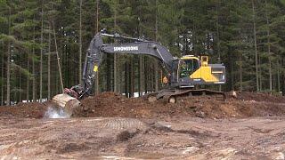 Volvo EC300E removing topsoil