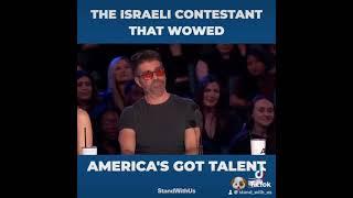 Roni Sagi an Israeli dog trainer along with her dog Rhythm on Americas Got Talent