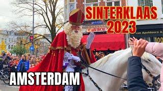 HOW AMSTERDAM CELEBRATES SINTERKLAAS IN THE NETHERLANDS - BOAT & STREETS PARADE AMSTERDAM