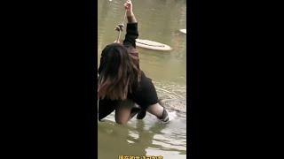 Wet high boots and fall into water while playing rope