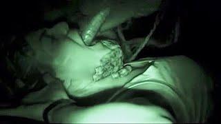 Monster force feeds woman parasitic worms.