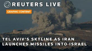 LIVE View of Tel Aviv’s skyline as Iran launches missiles into Israel