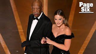 Morgan Freeman wears glove on left hand to Oscars 2023 — here’s why  Page Six Celebrity News