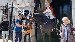 TOURIST BAG GOT STUCK in Horses Mouth  The Kings Guard smiled at Horse Guards in London